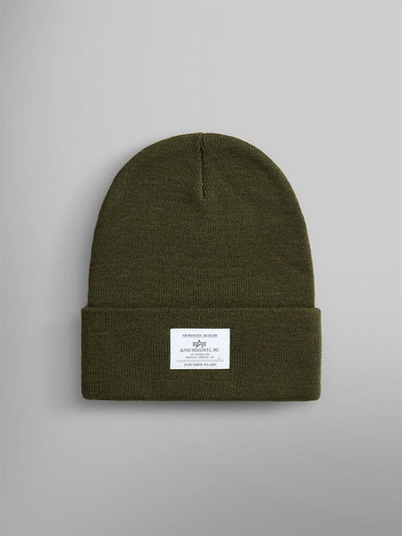 Olive Essential Beanie featuring a folded brim and an Alpha Industries, Inc. label on the front.