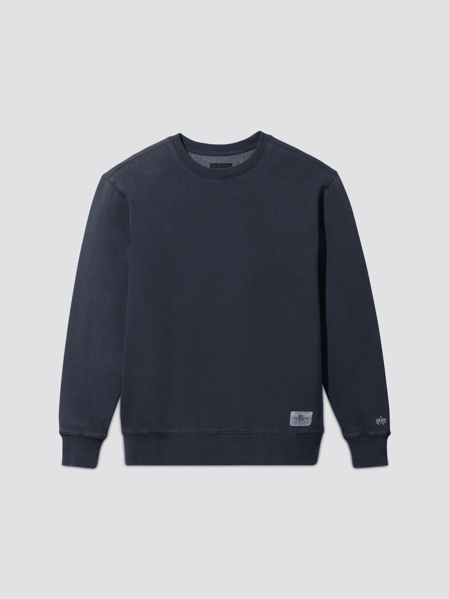 Alpha Industries Essential Washed Crewneck in Replica Blue, long sleeves, ribbed cuffs, garment washed.