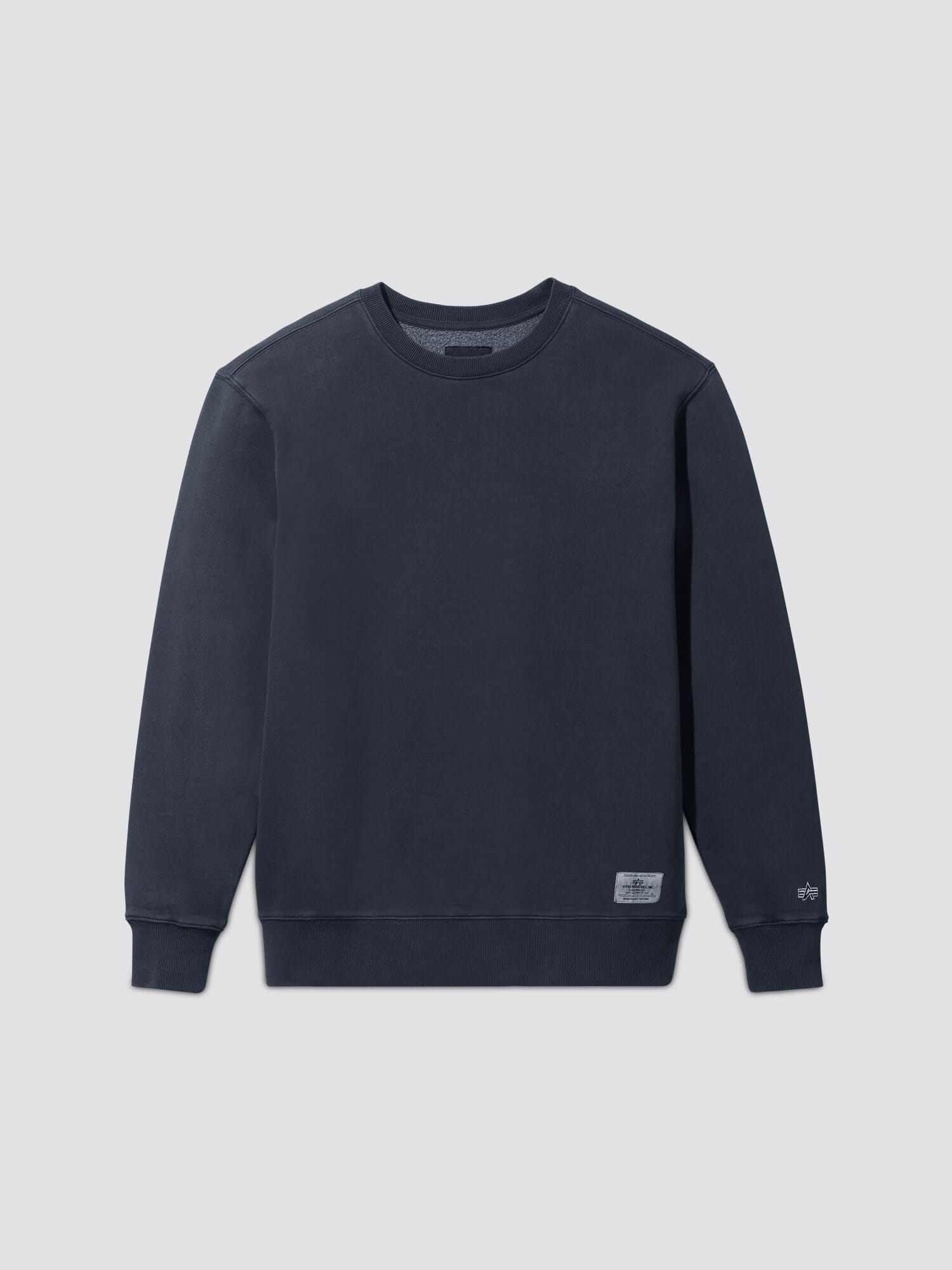 Alpha Industries Essential Washed Crewneck in Replica Blue, long sleeves, ribbed cuffs, garment washed.