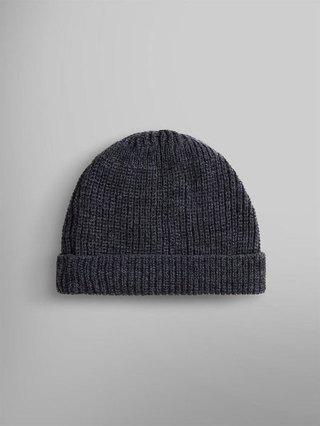 The Essential Watch Cap by Alpha Industries in a dark gray wool-blend provides both style and a subtle tribute to military history.