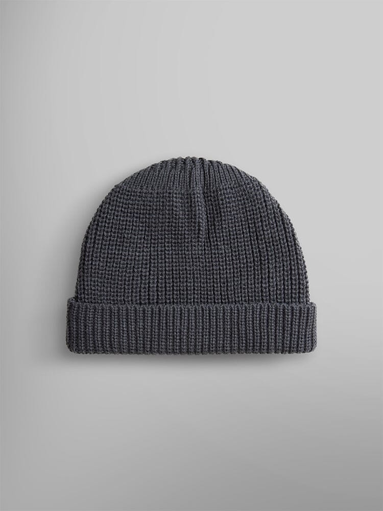 An Essential Watch Cap by Alpha Industries featuring a plain dark gray wool-blend knit design with a folded brim, embodying the classic style of a watch cap.