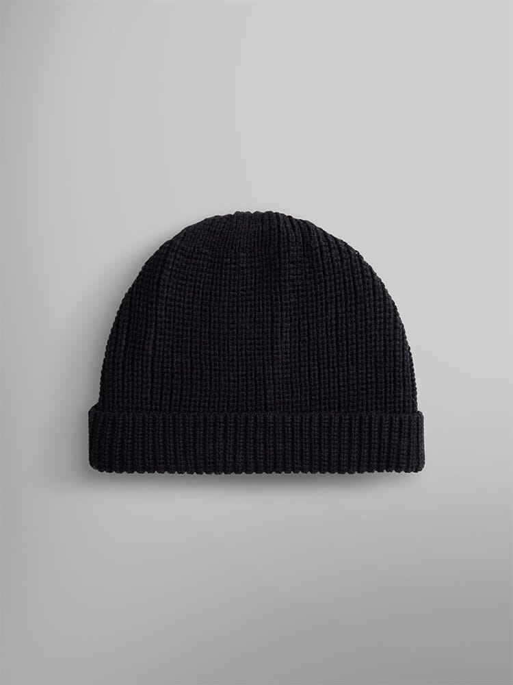 The Essential Watch Cap from Alpha Industries features a classic watch cap design in black wool-blend with a folded brim.