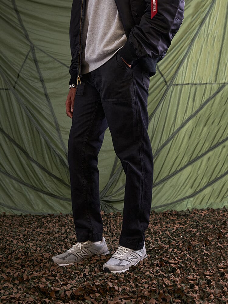Alpha Industries Fatigue Pant, gray, cotton, cargo pockets, button and zip closure.