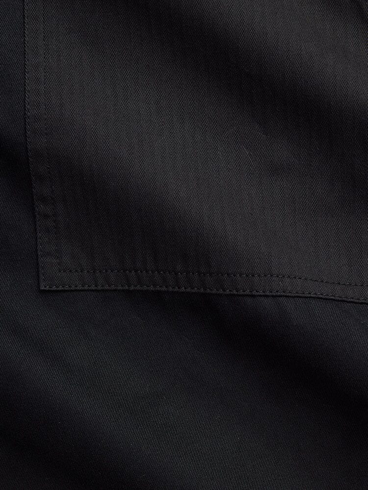 Alpha Industries Fatigue Pant in black cotton with herringbone pattern and rectangular utility pocket.