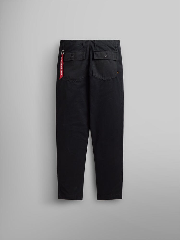 Alpha Industries Fatigue Pant, olive green with two buttoned utility pockets and red keychain on left pocket.