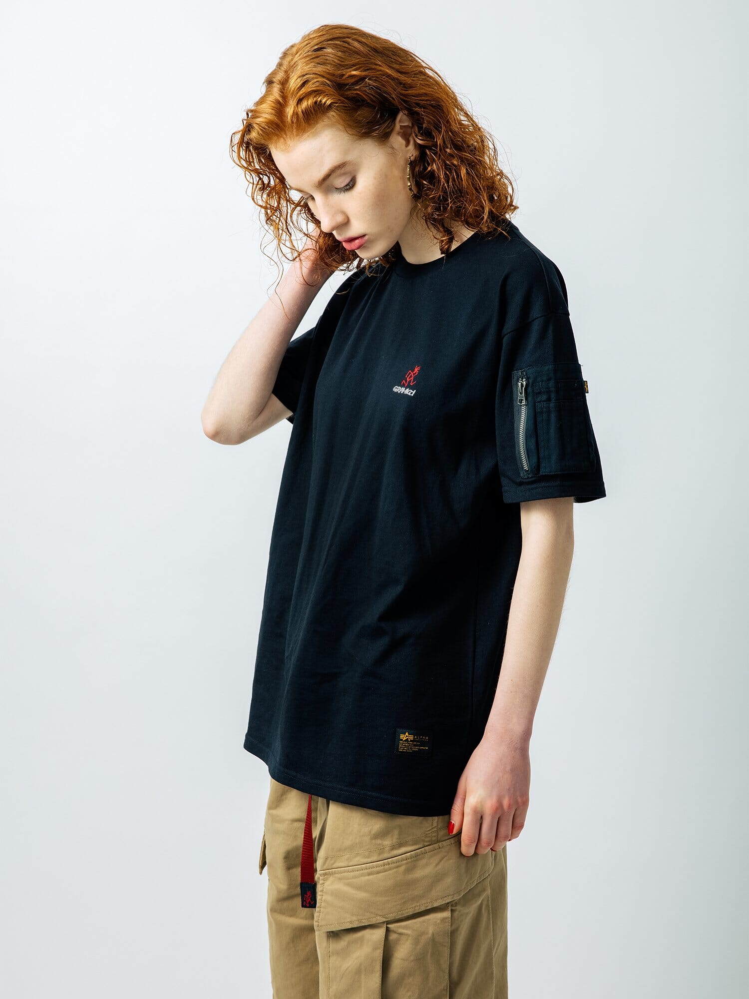 Alpha Industries Gramicci Cotton Cigar Pocket Tee, khaki cargo pants, cotton material, pocket detail.