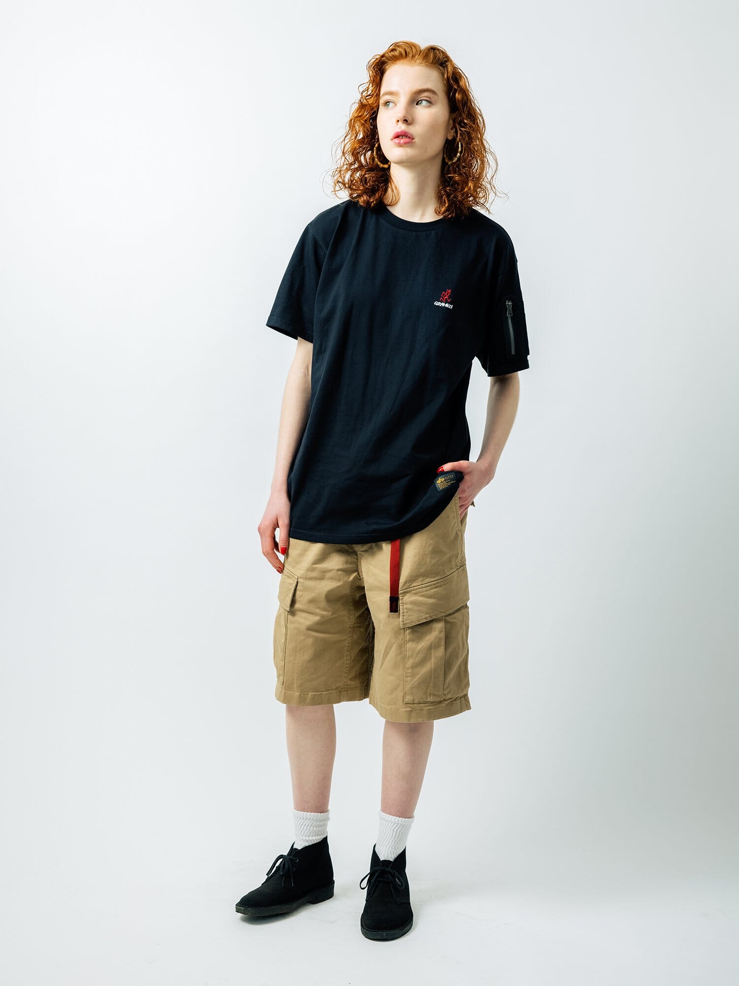 Gramicci X Alpha Cotton Cigar Pocket Tee by Alpha Industries, tan cotton cargo shorts, white socks, black shoes.