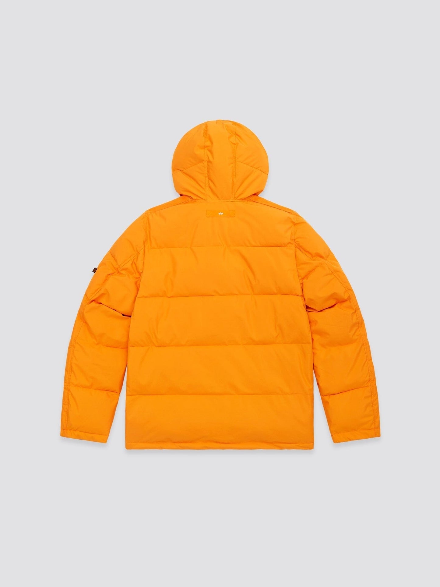 Bright orange "Hooded Puffer Jacket" by Alpha Industries, Inc., featuring an insulated hood and shown from the back.