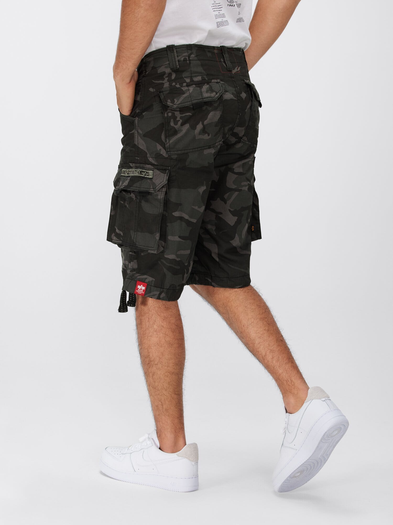 Alpha Industries Jet Short Camo cargo shorts, camouflage pattern, multiple pockets, button and zipper closure.