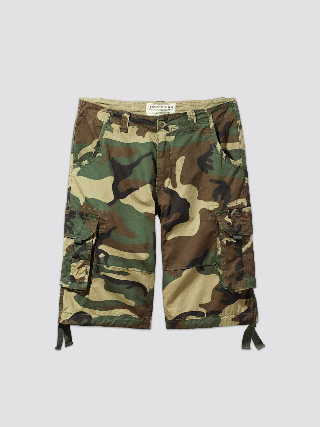 Alpha Industries Jet Short Camo, cotton camo cargo shorts with side pockets, button-zip closure, and drawstring leg ties.