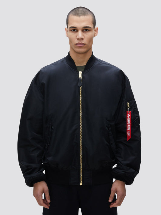 Alpha Industries L-2B Loose Bomber Jacket, black, gold zipper, red sleeve tag.