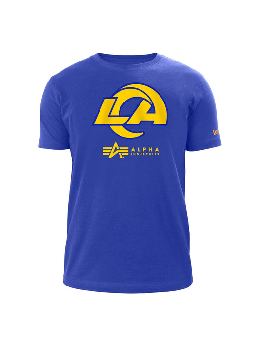 This Los Angeles Rams x Alpha x New Era T-shirt by Alpha Industries / NE-NFL features a striking yellow LA emblem and text, skillfully crafted with twill applique for enhanced style. The shirt comes in a vibrant blue color.