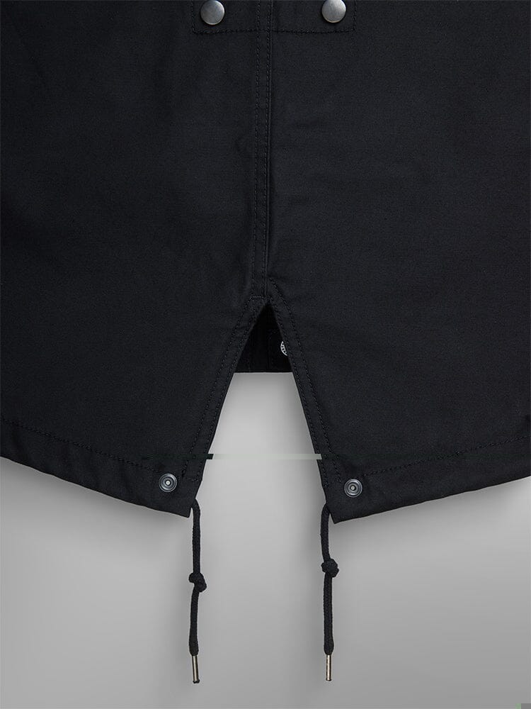 Alpha Industries M-59 Fishtail Mod Parka in black, split opening with snap buttons and dual drawstrings.