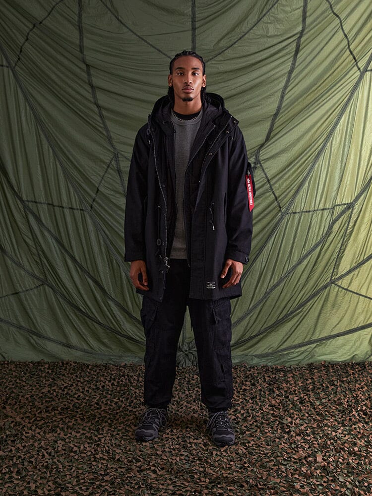 Alpha Industries M-59 Fishtail Mod Parka, black color, parachute-like fabric, front zip and snap closures.