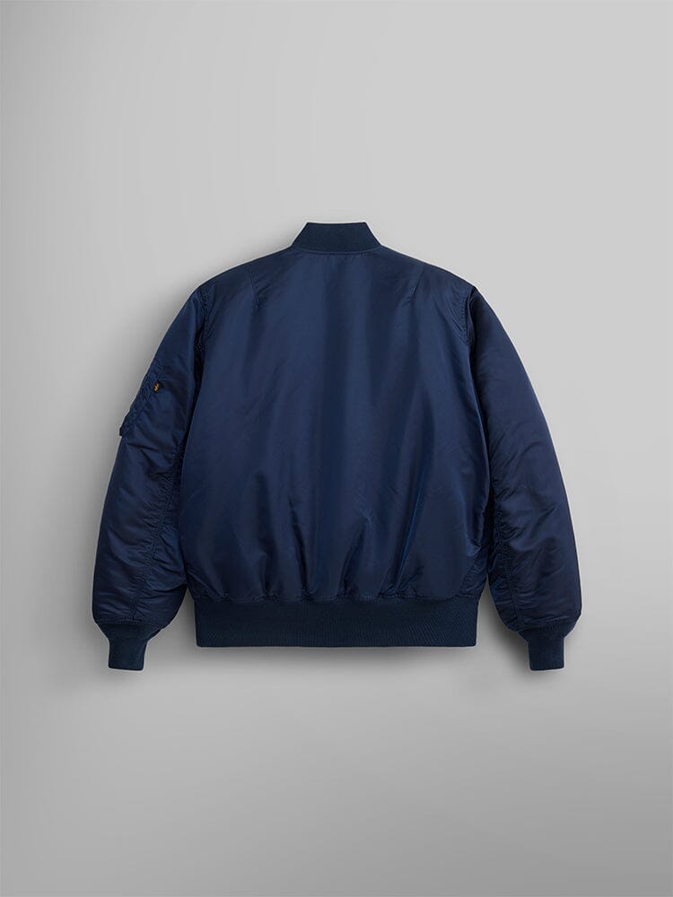 Alpha Industries MA-1 Bomber Jacket in navy with ribbed cuffs, collar, and waistband.