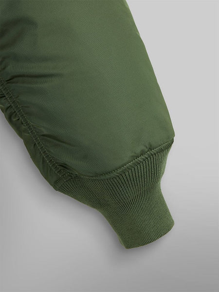 Close up view of MA-1 Bomber Jacket (Heritage) in Green (Sage). Sleeve and ribbed cuff. By Alpha Industries.