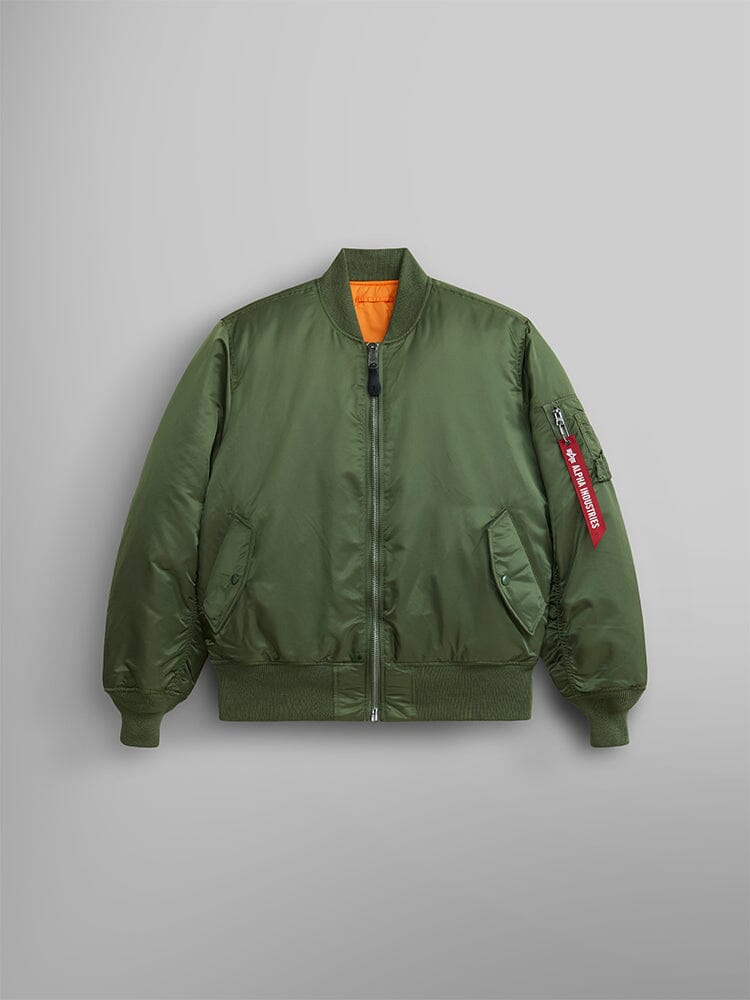 Alpha Industries MA-1 bomber jacket in sage flight nylon with front zipper, ribbed cuffs and hem, orange lining, sleeve zip pocket.