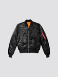 Front flat-lay view of black Alpha Industries MA-1 Bomber Jacket Slim Fit showing orange lining and sleeve pocket with red tag.