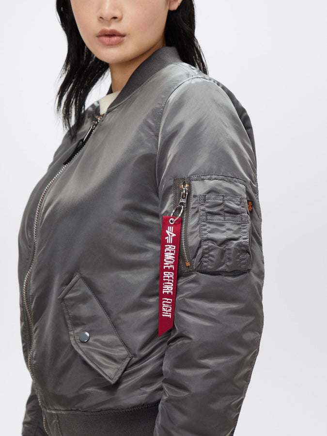 Alpha Industries MA-1 Bomber Jacket W, gray, red Remove Before Flight tag on sleeve zipper.