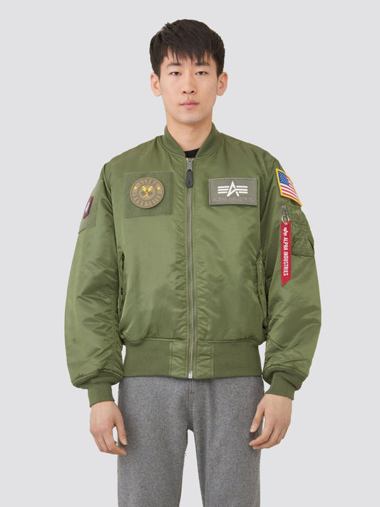 Alpha Industries MA-1 Flex Bomber Jacket, sage green, front view, zip closure.