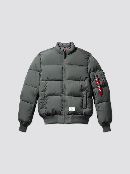 Alpha Industries MA-1 Quilted Bomber Jacket in Gunmetal, front zipper, ribbed cuffs and hem, zippered sleeve pocket with red tag, water-resistant puffer design.