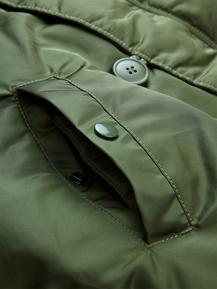 N-2B Short Waist Parka by Alpha Industries, olive green, buttoned pocket, snap fastener, quilted water repellent fabric, stitching details.