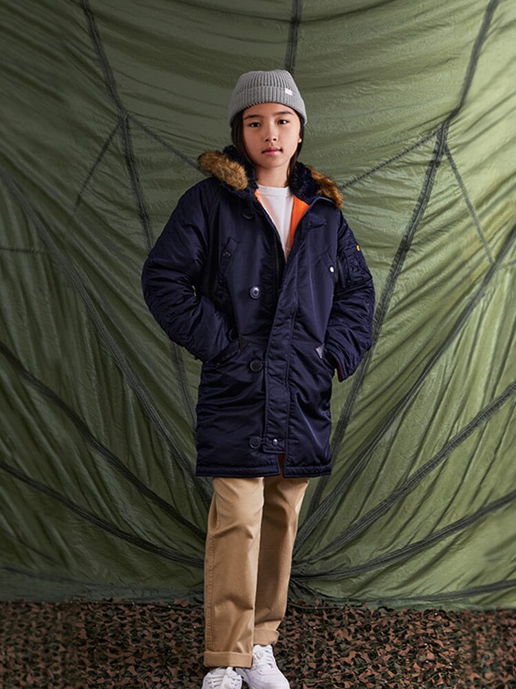Alpha Industries N-3B Parka Youth, fur-trimmed hood, gray, front zipper closure.