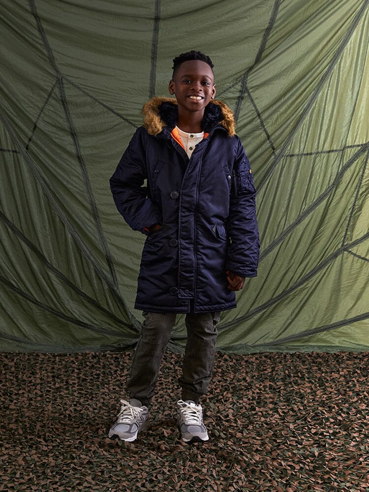 Alpha Industries N-3b Parka Youth, fur-trimmed hood, olive, zip closure.