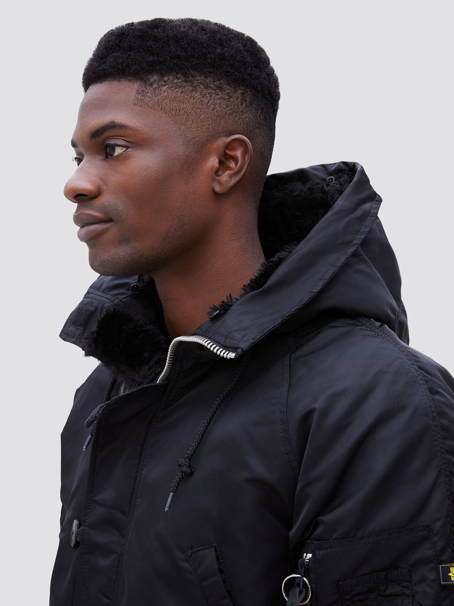 Alpha Industries N-3B Slim Gen I Parka, black, insulated, zip and button closures.
