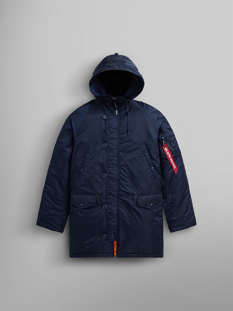 Alpha Industries N-3b Slim Fit Parka, navy, front buttons, flap pockets, signature red tag on left sleeve.