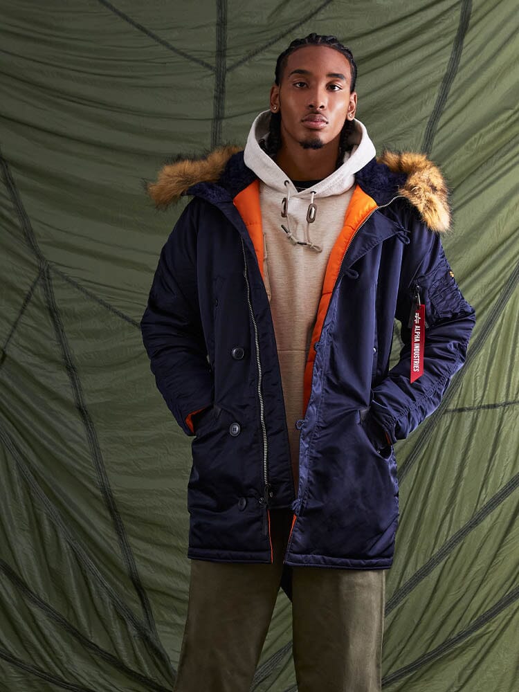 Alpha Industries N-3B Slim Fit Parka, fur-trimmed hood, green, quilted design.