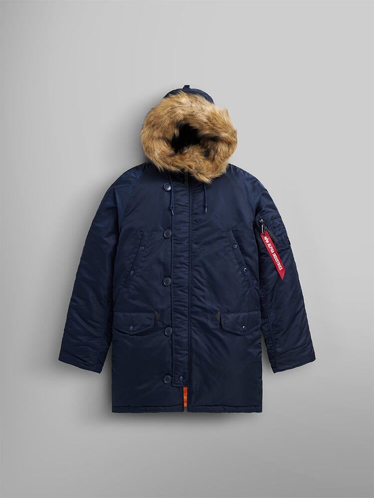 Alpha Industries N-3B Slim Fit Parka, Replica Blue, faux fur-lined hood, water resistant fabric, front buttons, flap pockets, red sleeve tag.