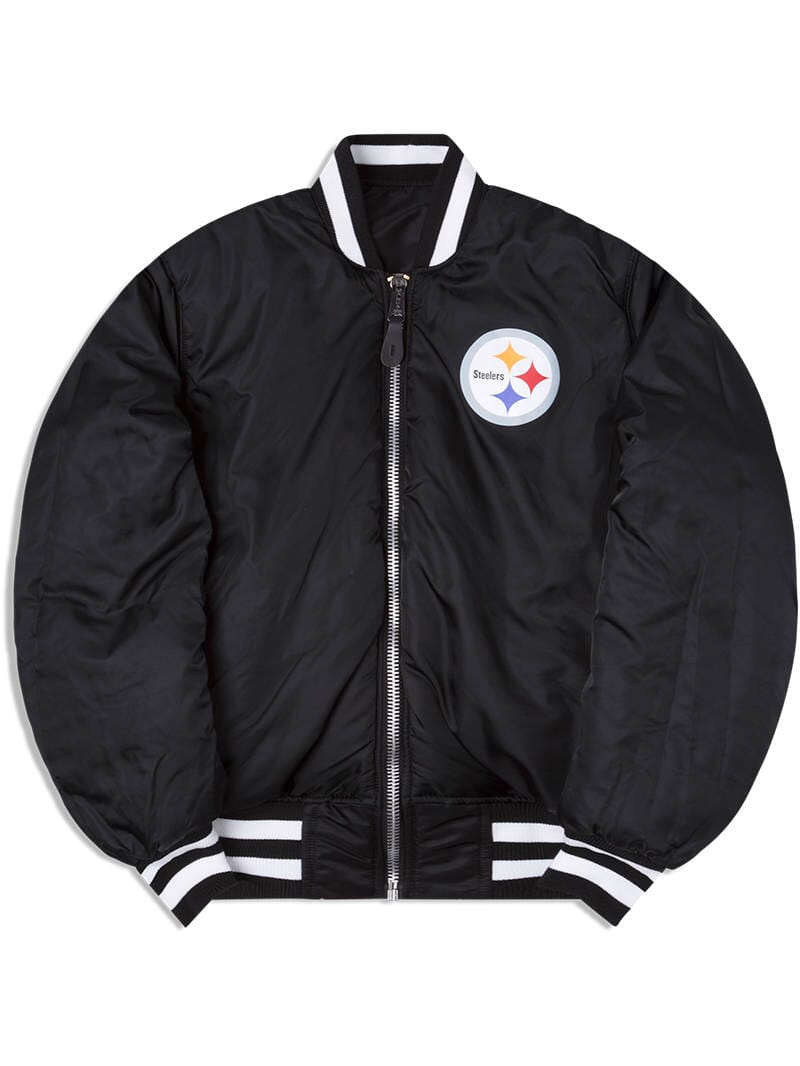 Experience the Pittsburgh Steelers X Alpha X New Era MA-1 Bomber Jacket by Alpha Industries, a black varsity-style bomber with white stripes on the collar and cuffs, adorned with a Steelers logo on the left chest and enhanced with NFL team patches for extra flair.