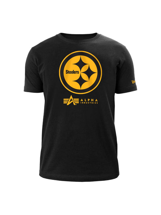 The Pittsburgh Steelers x Alpha x New Era T-Shirt in black showcases a vibrant yellow Steelers logo in twill applique screenprint, accompanied by the Alpha Industries branding on the front.