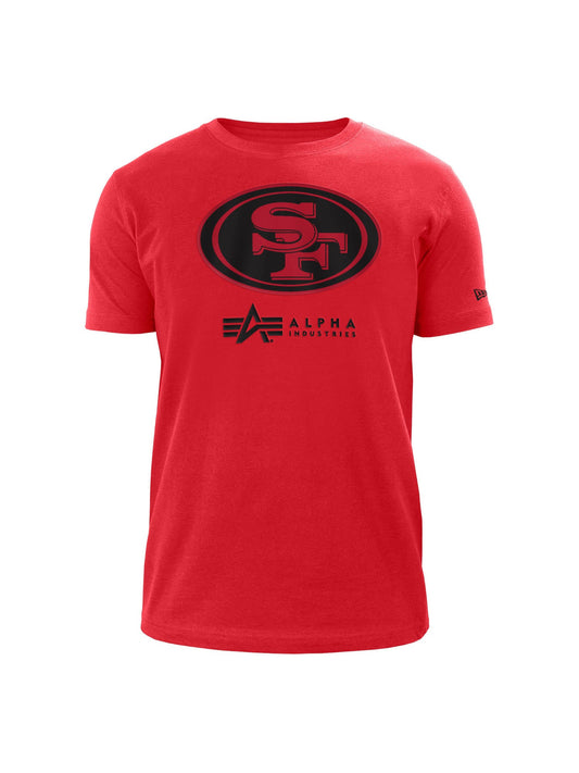 This red San Francisco 49ers x Alpha x New Era T-Shirt by Alpha Industries showcases a striking screen print featuring a black SF team logo within an oval, with the stylish Alpha Industries text positioned below.